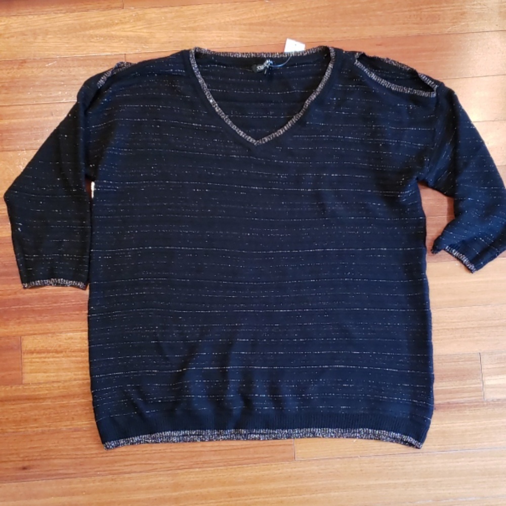 NEW! Black and gold knit top with cold shoulders.